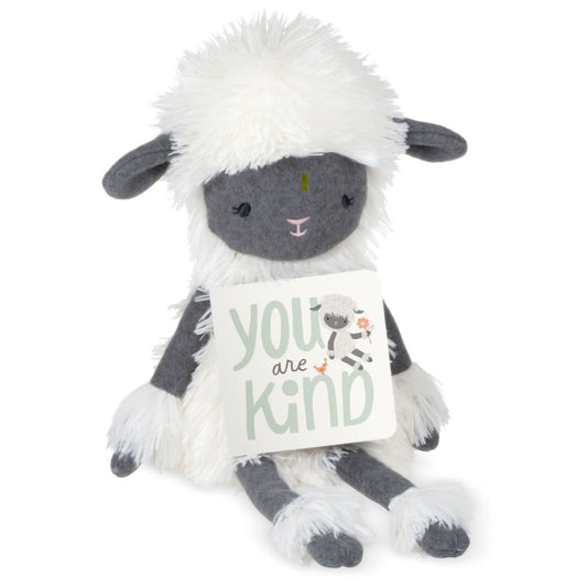 MopTops Highland Sheep- You Are Kind plush toy with fluffy hair and holding a board book, ideal gift for children.