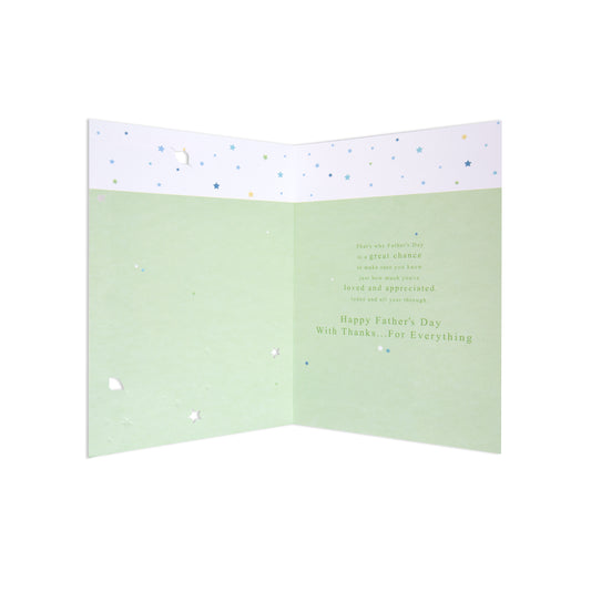 Male Opn 150 greeting card with starry design, featuring heartfelt Father's Day message inside, flat lay view