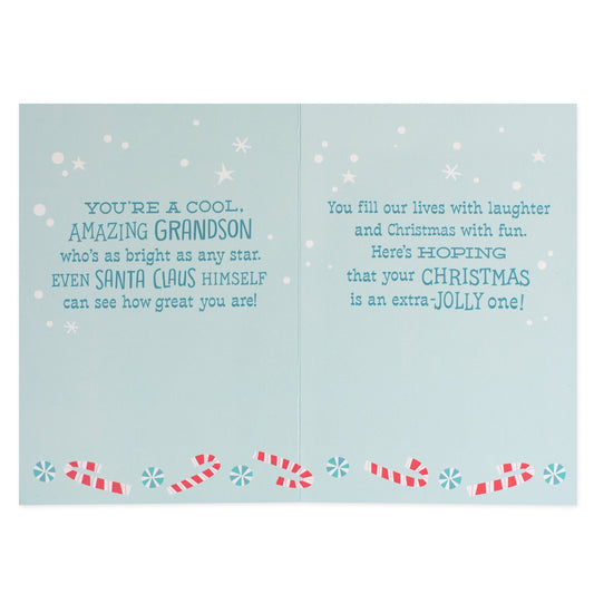 Hallmark Christmas Card For Grandson - Extra Jolly, open view, with blue background, candy canes, and festive messages inside.