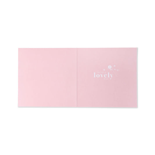 Hallmark Mother's Day Card - Floral open view, featuring a baby pink design with white floral details and the word 'lovely'.