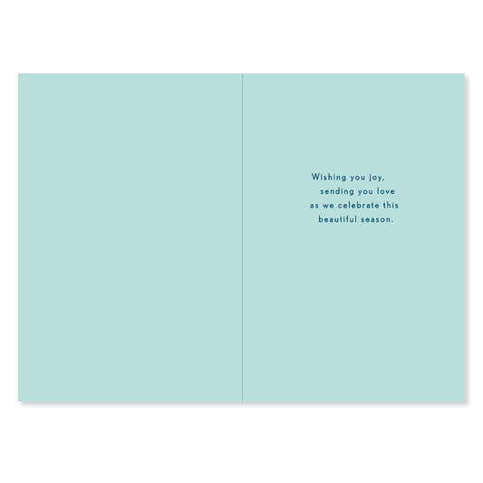 Hallmark Christmas card - Angel Blessings interior design with blue background featuring festive greeting message.