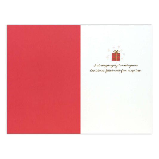 Hallmark Signature Christmas Card - Fun surprises, interior view featuring festive greeting and simple gift illustration.