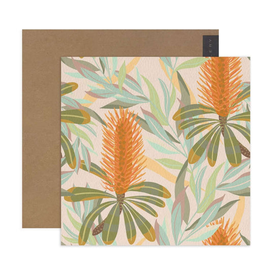 Hallmark x Christie Williams Gallery Blank Greeting Card - Banksia Burst featuring vibrant banksia flowers and leaves, flat lay view.