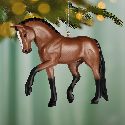 Warmblood Dream Horse — 2026 Hallmark Keepsake Christmas Ornament, light bay colour, featuring braided mane, hanging from a tree