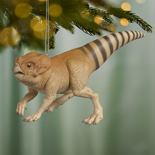 Jurassic World Rebirth "Dolores" the Aquilops — 2026 Hallmark Keepsake Christmas Ornament, detailed view hanging from a tree.