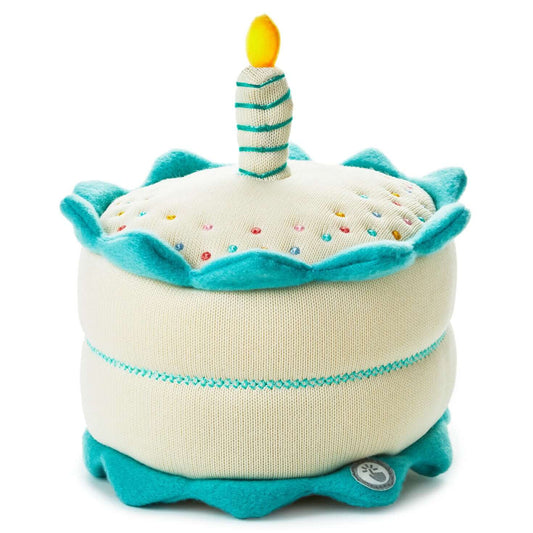 Birthday cake musical plush with light, soft fabric cake with candle detail, colourful sprinkles and teal trim.
