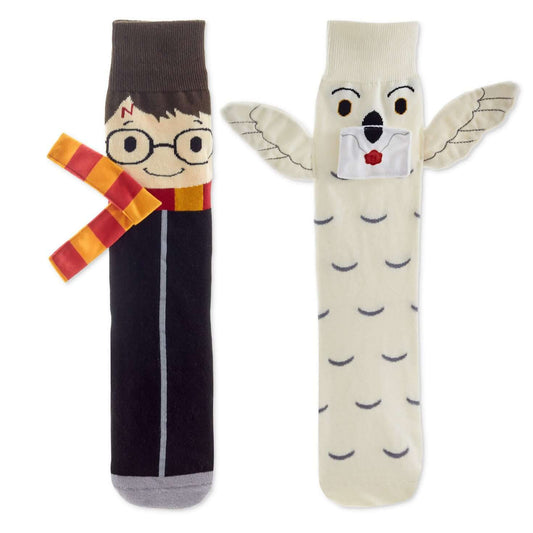 Harry Potter™ and Hedwig™ novelty crew socks featuring Harry in Hogwarts robe and Hedwig with wings, displayed side by side.