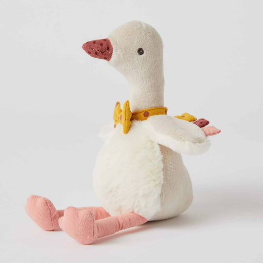 Gregory Goose Rattle in cream and multi colour with a mustard bow tie, soft velour and plush fur, side view.
