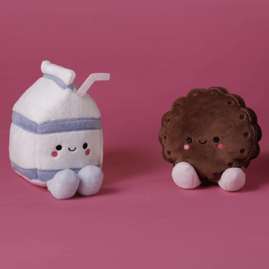 Milk and Cookie, Magnetic Plush - Better Together set of two plush characters with adorable facial expressions, sitting against a pink background.