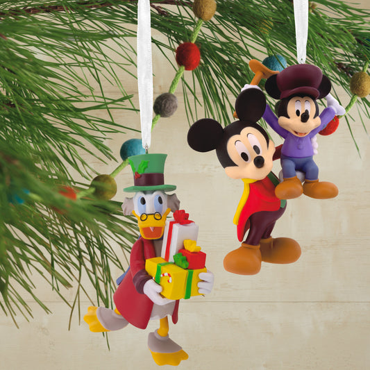 Hallmark Christmas ornaments - Disney Mickey's Christmas Carol, set of 2, featuring Mickey Mouse and Scrooge McDuck hanging from a pine branch.