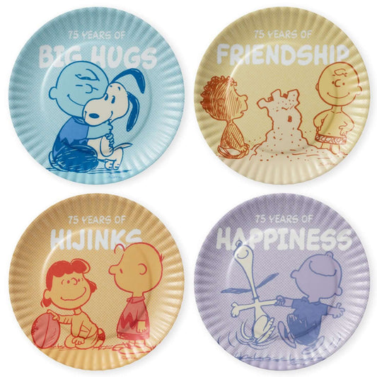 Peanuts® 75th Anniversary Appetizer Plate Set featuring four small plates with iconic characters and cheerful designs in pastel colours.
