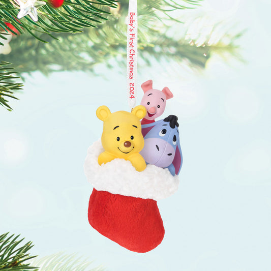 Disney Winnie the Pooh, A Snuggly First Christmas — Hallmark Keepsake Christmas Ornament featuring Pooh, Piglet and Eeyore in a red stocking, detailed view.