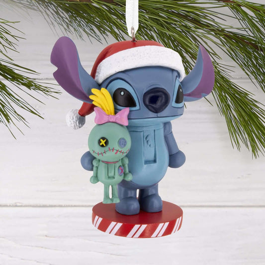 Disney Stitch Nutcracker - Hallmark Christmas Ornament featuring Stitch in a Santa hat holding Lilo's doll Scrump, detailed view.