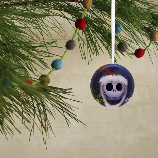 Disney Tim Burton's The Nightmare Before Christmas, tin ball, set of 12 - Hallmark Christmas ornament, featuring Jack Skellington in a festive hat, hanging from a tree branch.