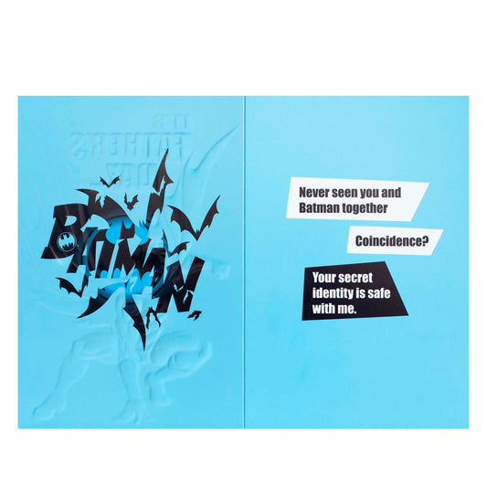 Card with 'Bat-Mite' design and text on a light blue background