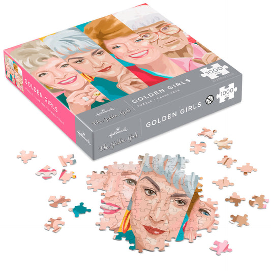 The Golden Girls 1000-Piece Jigsaw Puzzle, colourful character illustrations, angled view of the puzzle with pieces scattered.