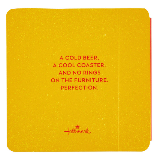 Beers to You: 20 Coasters to Say Cheers to Book, humorous yellow coaster with text on a flat lay background.