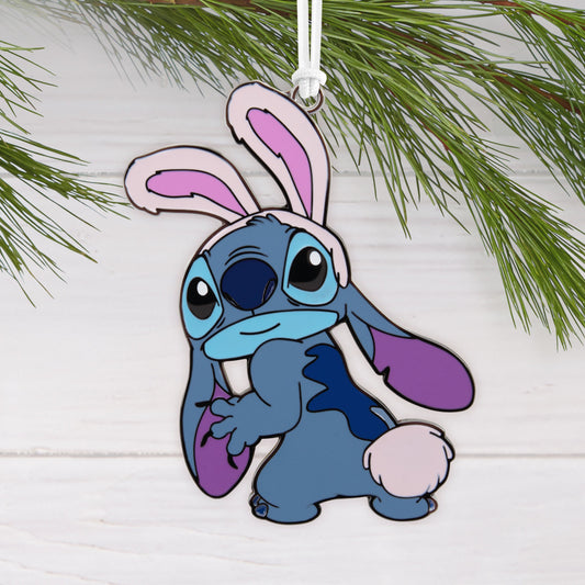 Hallmark ornament (Disney Stitch Bunny, Metal) featuring Stitch in pink rabbit ears against a pine backdrop.