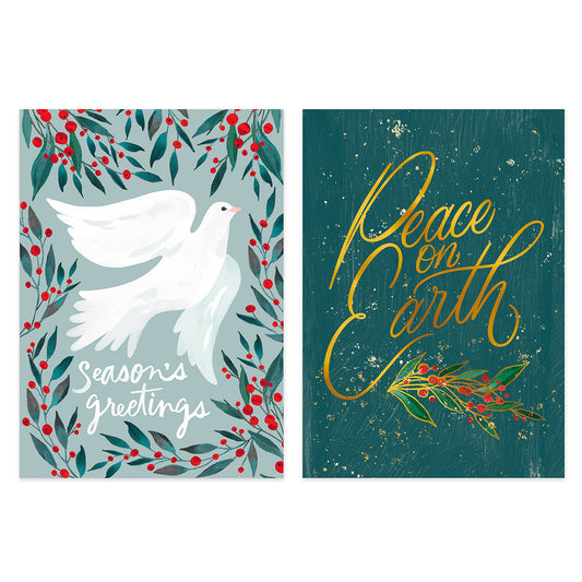 Two Christmas greeting cards shown side by side on a white background. The left card has a white dove surrounded by green leaves and red berries with the text 'seasons greetings.