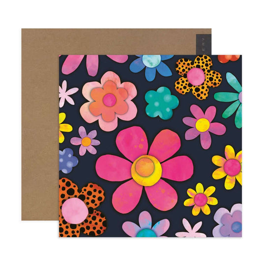 Hallmark x Kasey Rainbow Gallery Blank Greeting Card - Fluorescent Florals with colourful floral patterns against a dark background.
