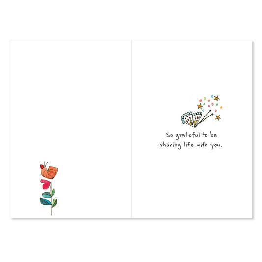 Greeting card with floral illustration and text on a white background