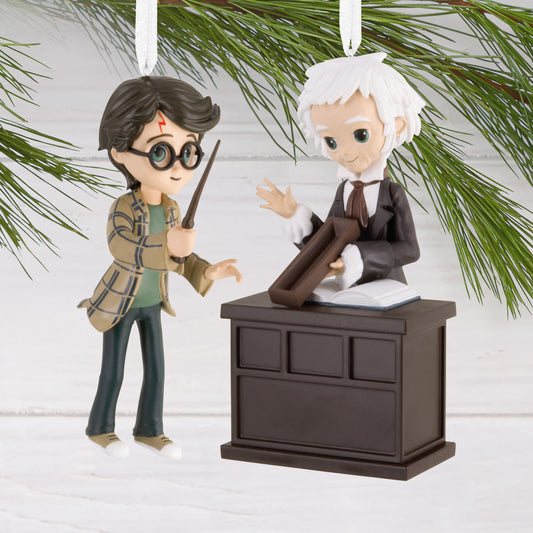 Hallmark Christmas Ornaments - Harry Potter and Ollivander, Set of 2 featuring stylised figures of Harry Potter holding a wand and Ollivander behind a desk.