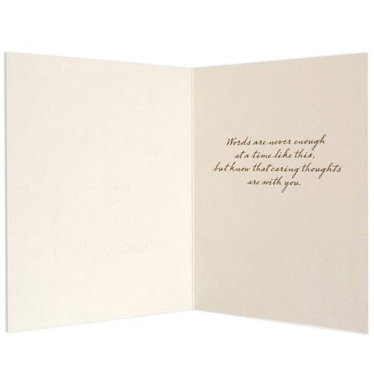 Kind & compassionate green cherry blossom sympathy card inside view with heartfelt message in elegant gold lettering.