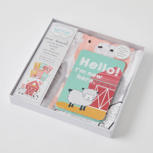 Farm animals milestone muslin set in gift box, featuring cotton blanket and milestone cards with sheep design.