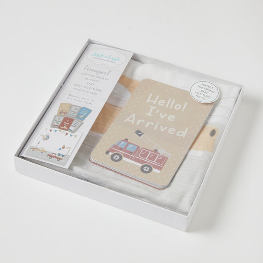 Transport milestone muslin set in gift box, featuring truck-themed milestone card and 100% cotton muslin blanket.