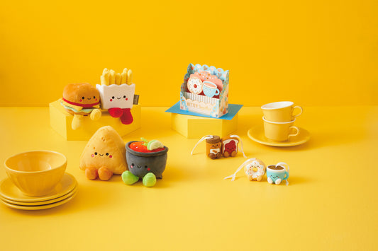 Burger and Fries Magnetic Plush – Better Together set on yellow background, featuring soft toy burger, fries, and other playful characters with vibrant colours.
