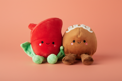 Better Together Rose and Truffle Magnetic Plush Pair, 5.25" in red and brown, featuring cute smiling faces, close up view.