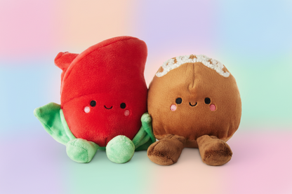 Better Together Rose and Truffle Magnetic Plush Pair, 5.25" featuring a red rose and chocolate truffle, displayed in soft focus background.