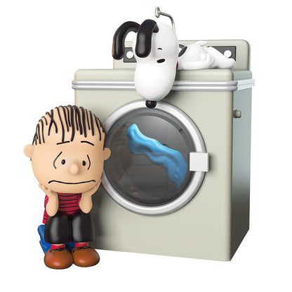 The Peanuts Gang Waiting Game With Light and Motion — 2026 Hallmark Keepsake Christmas Ornament featuring Linus and Snoopy near a washing machine.