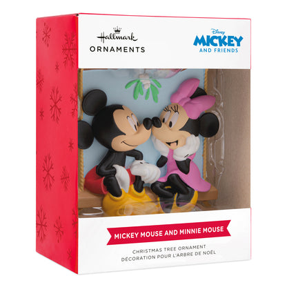 Hallmark Christmas ornament - Disney Mickey and Minnie on swing, featuring a romantic scene in a vibrant packaging.