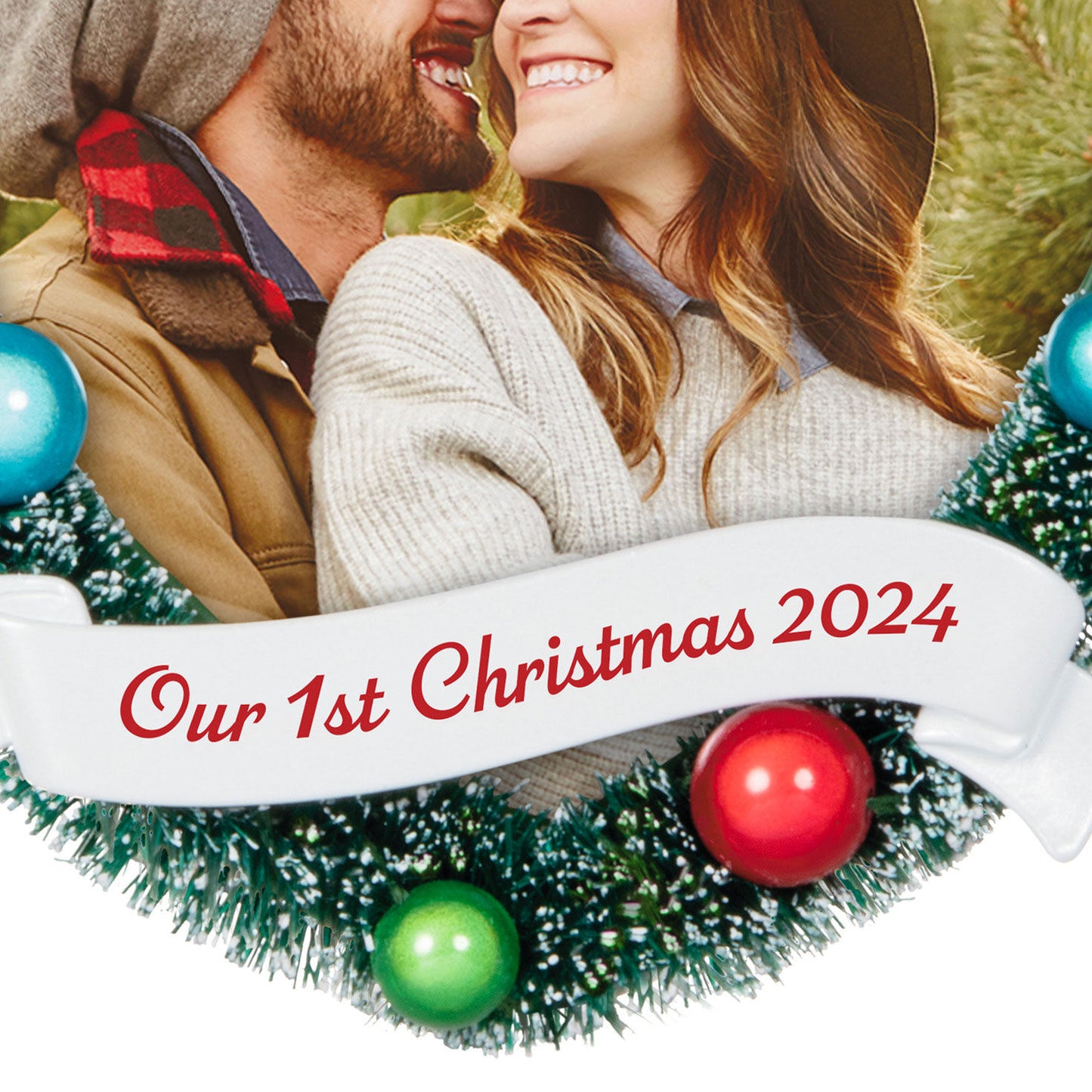 Our 1st Christmas photo frame — Hallmark Keepsake Christmas ornament featuring a frosted wreath design with colourful baubles.