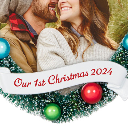 Our 1st Christmas photo frame — Hallmark Keepsake Christmas ornament featuring a frosted wreath design with colourful baubles.