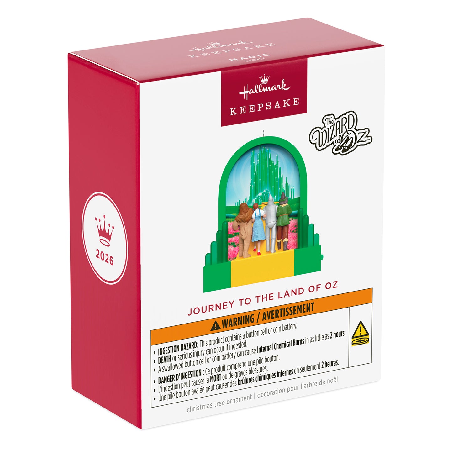 The Wizard of Oz™ Journey to the Land of Oz With Light — 2026 Hallmark Keepsake Christmas Ornament box packaging featuring warning and design details.