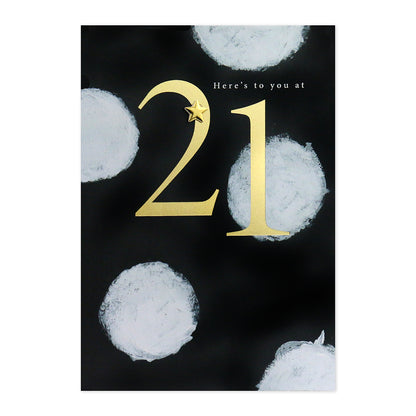 Connections from Hallmark 21st Birthday Card - Gold Foil Numbers, black background, gold foil '21' design with white spots, flat lay view.