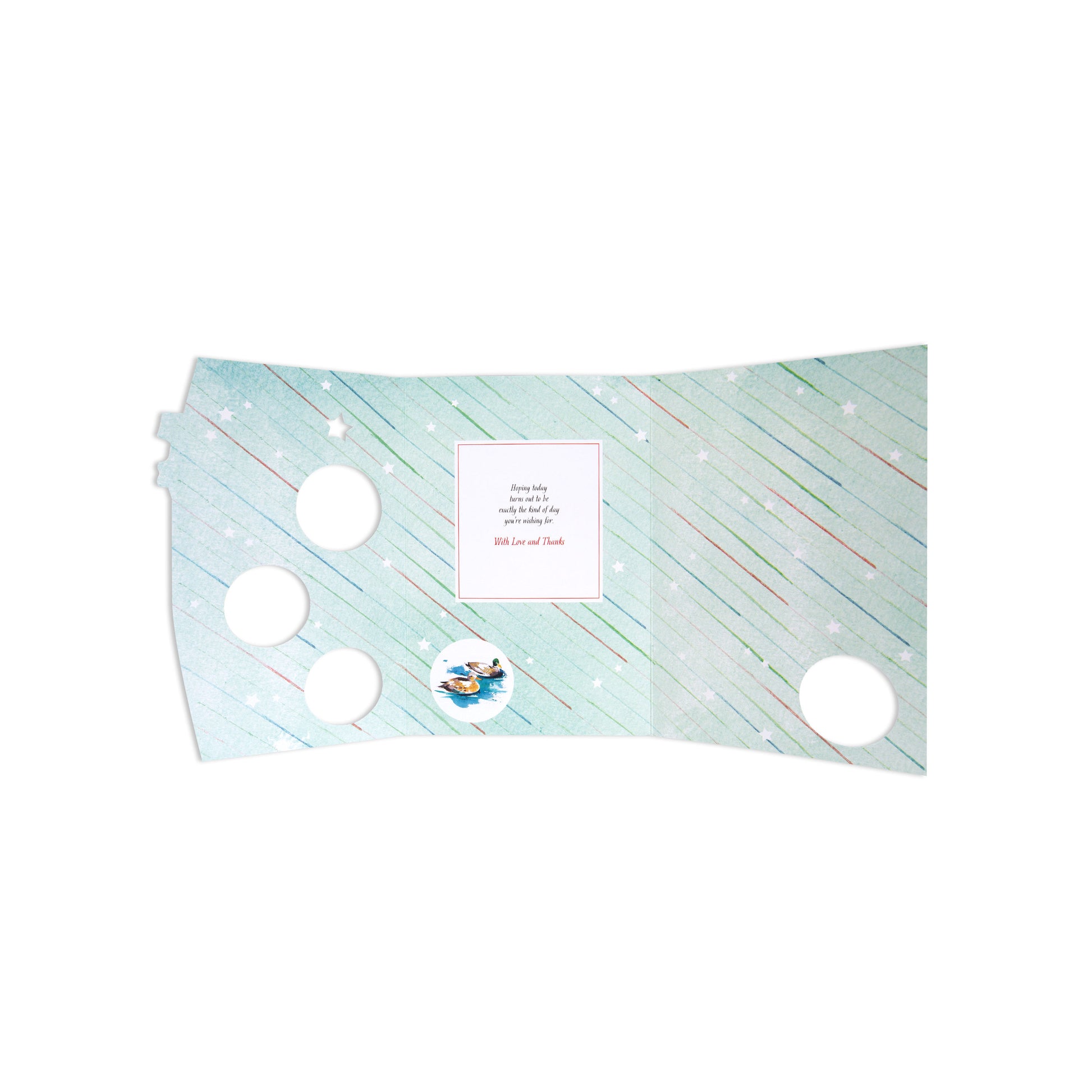 Fcc Gen Male Wishlighthouse card with pastel design, featuring cut-out circles and a message inside, flat lay view.