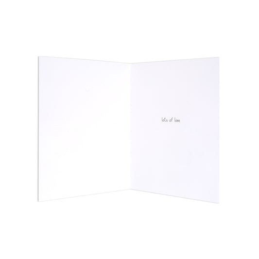 An open white greeting card with the words 'let's, love' printed in small black script on the right-hand page, shown against a solid white background.