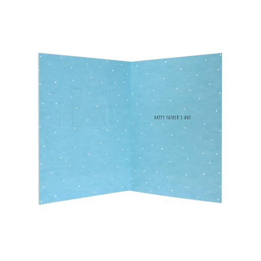 An open light blue Father's Day greeting card with a white polka dot pattern and the text 'HAPPY FATHER'S DAY' printed on the right panel.