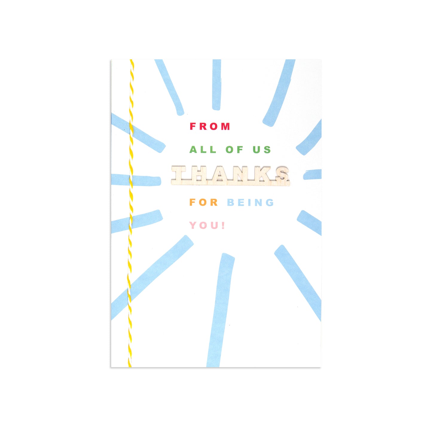 A square greeting card with a white background, featuring a light blue sunburst pattern and a yellow twisted thread spool graphic along the left edge. The text on the card reads 'FROM ALL OF US THANKS FOR BEING YOU!' in red, green, beige, and pink lettering.