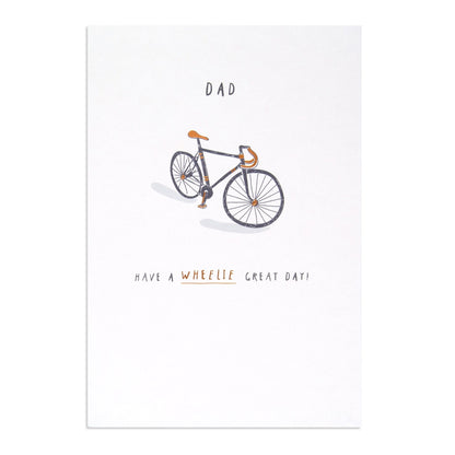Hallmark Father's Day Card - Wheelie Great featuring a bicycle illustration and punny message for fathers, flat lay view.