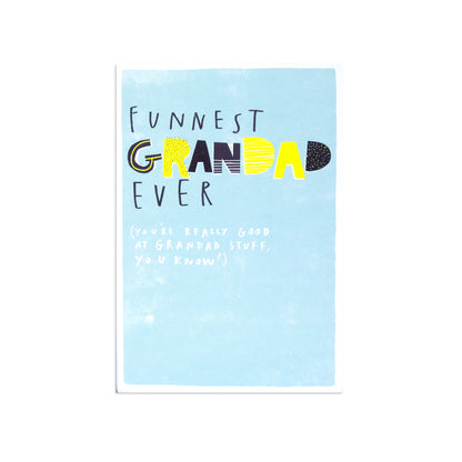 Fcc Grandad Funniest greeting card, bright blue background with playful text design, flat lay view.