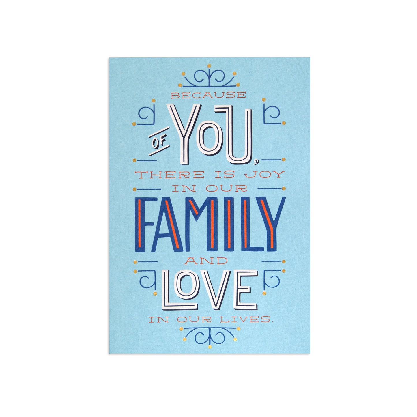 A square art print with a light blue background featuring a decorative typographic design that reads, 'BECAUSE OF YOU THERE IS JOY IN OUR FAMILY AND LOVE IN OUR LIVES.' The text uses white, navy blue, and orange-red lettering with small ornamental flourishes.