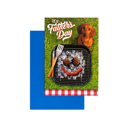 Hallmark Father's Day Card - Well Done featuring a dachshund and BBQ scene with coordinating blue envelope in a flat lay.