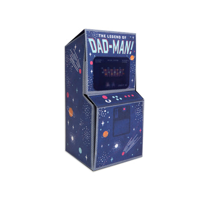 A retro-style arcade machine cabinet titled 'The Legend of Dad-Man!' with a dark blue space-themed exterior decorated with stars, planets, and shooting stars, shown on a plain white background.