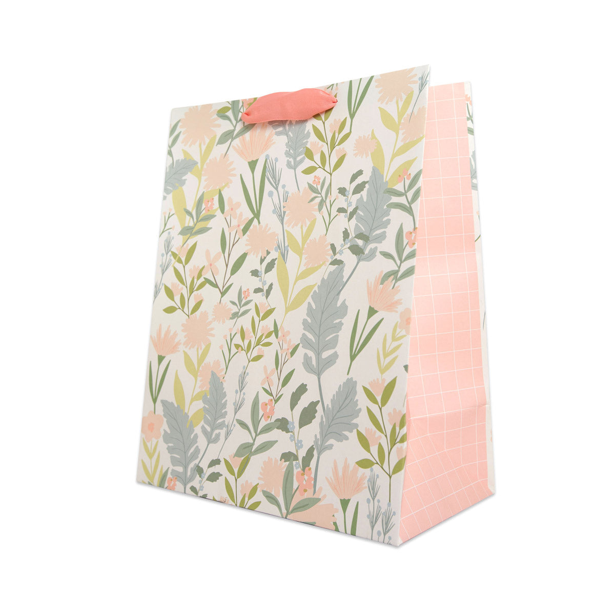 A tall paper gift bag with a floral print on the front and a pink grid pattern on the side, featuring coral-colored paper handles against a plain white background.