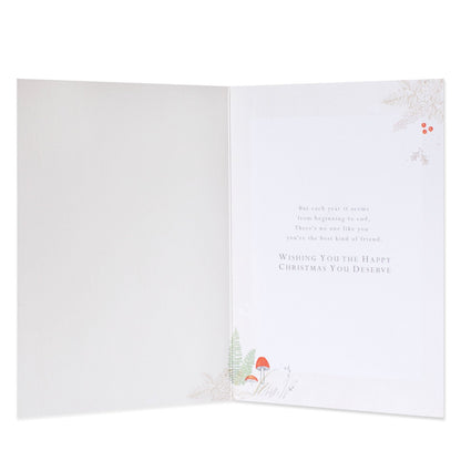 Hallmark Christmas Card For Friend - Woodland Foxes, open view, featuring warm holiday message and delicate illustrations of foliage and mushrooms.