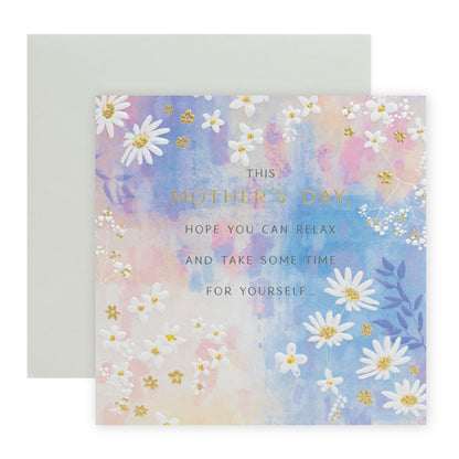 Hallmark Mother's Day Card with floral designs and gold foil text, flat lay view on a white background.